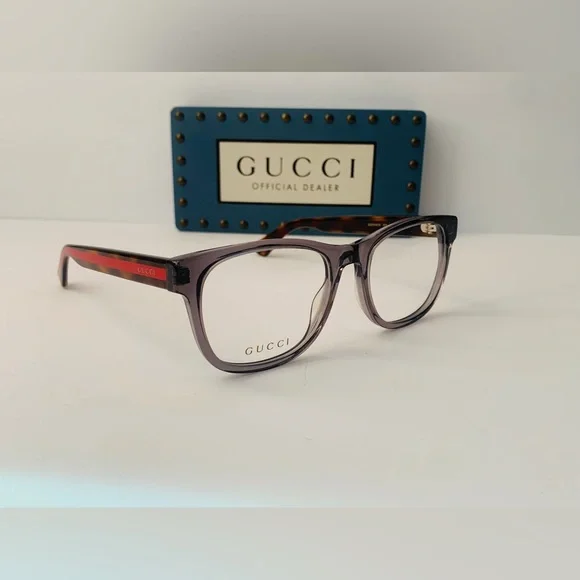 Gucci's GG0004ON features soft lines frames acetate front. Iconic web effect